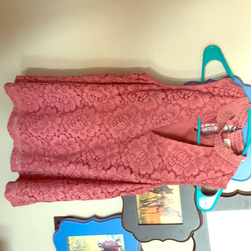 Blush pinkish tank with key hole